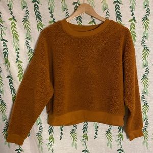 Fuzzy orange sweatshirt